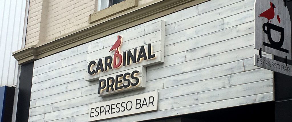 The sign installation of Cardinal Press's "espresso bar" business sign.