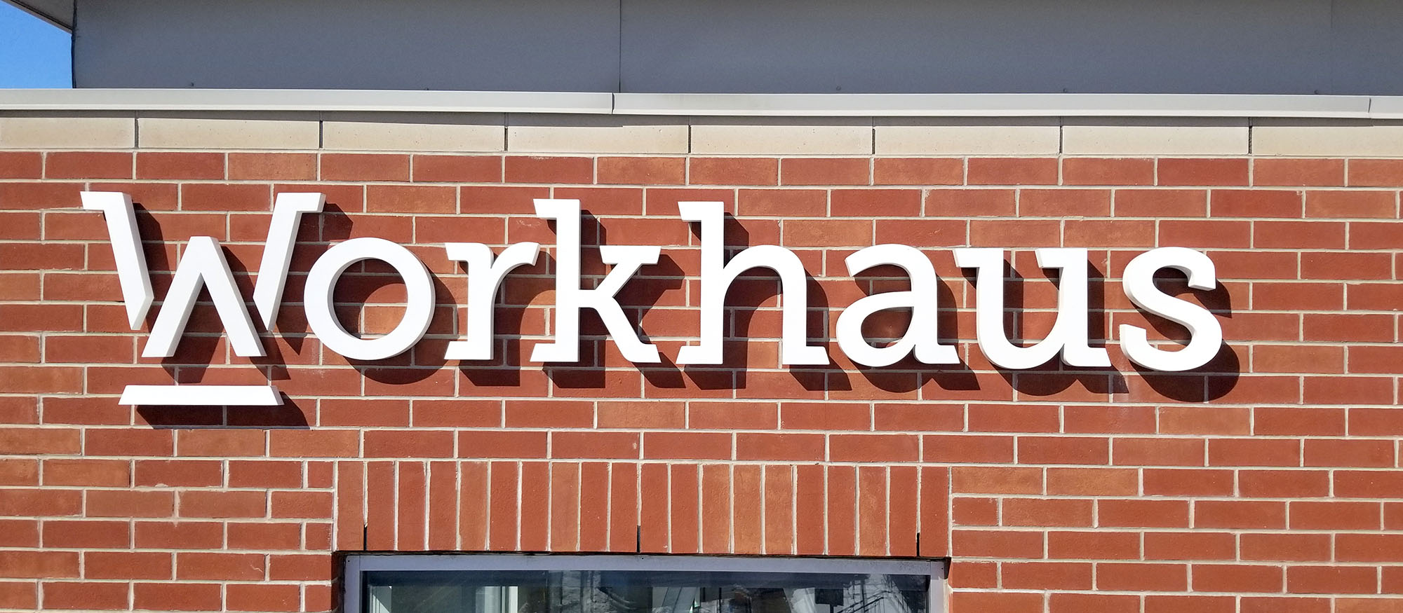 Best custom fabrication metal and acrylic Storefront signs in Newmarket. Workhaus Channel letters designed, fabrication and install Toronto, GTA, Richmond Hill, Vaughan, York Region and Ontario
